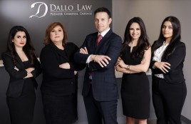 Group shot of J. Dallo and his legal team.
